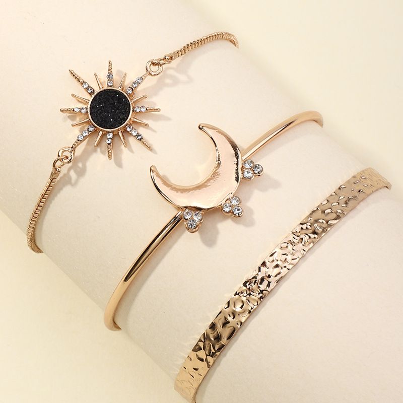 Set of three Bracelets, Earth, Moon and Sun